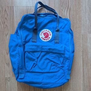 Fjallraven Kanken Backpack in Bright Blue with Red Logo
